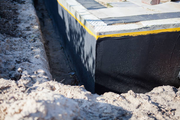 Professional Exterior Waterproofing technician working in Brielle, NJ